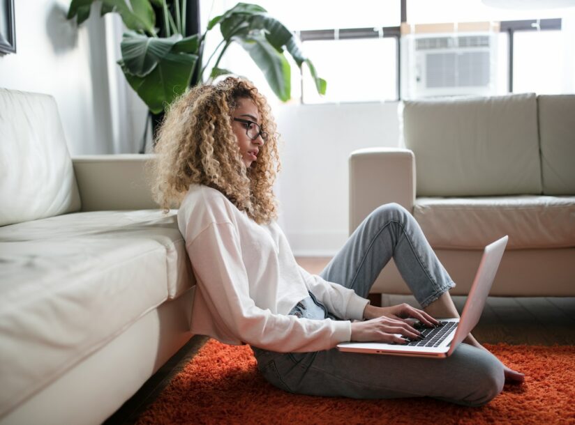 woman checking her credit report after filing a consumer proposal