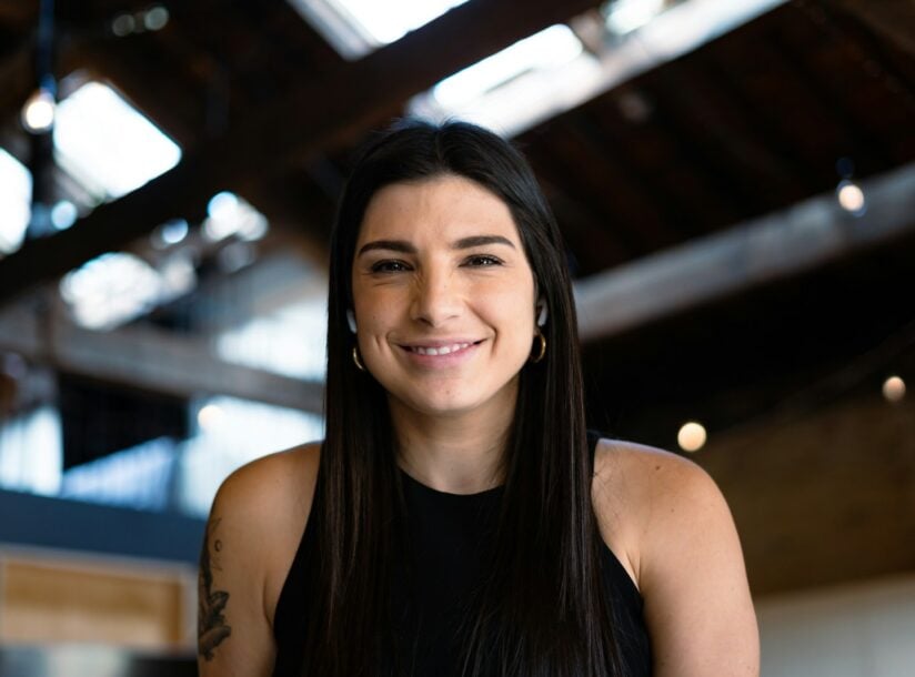 smiling woman in black tank top